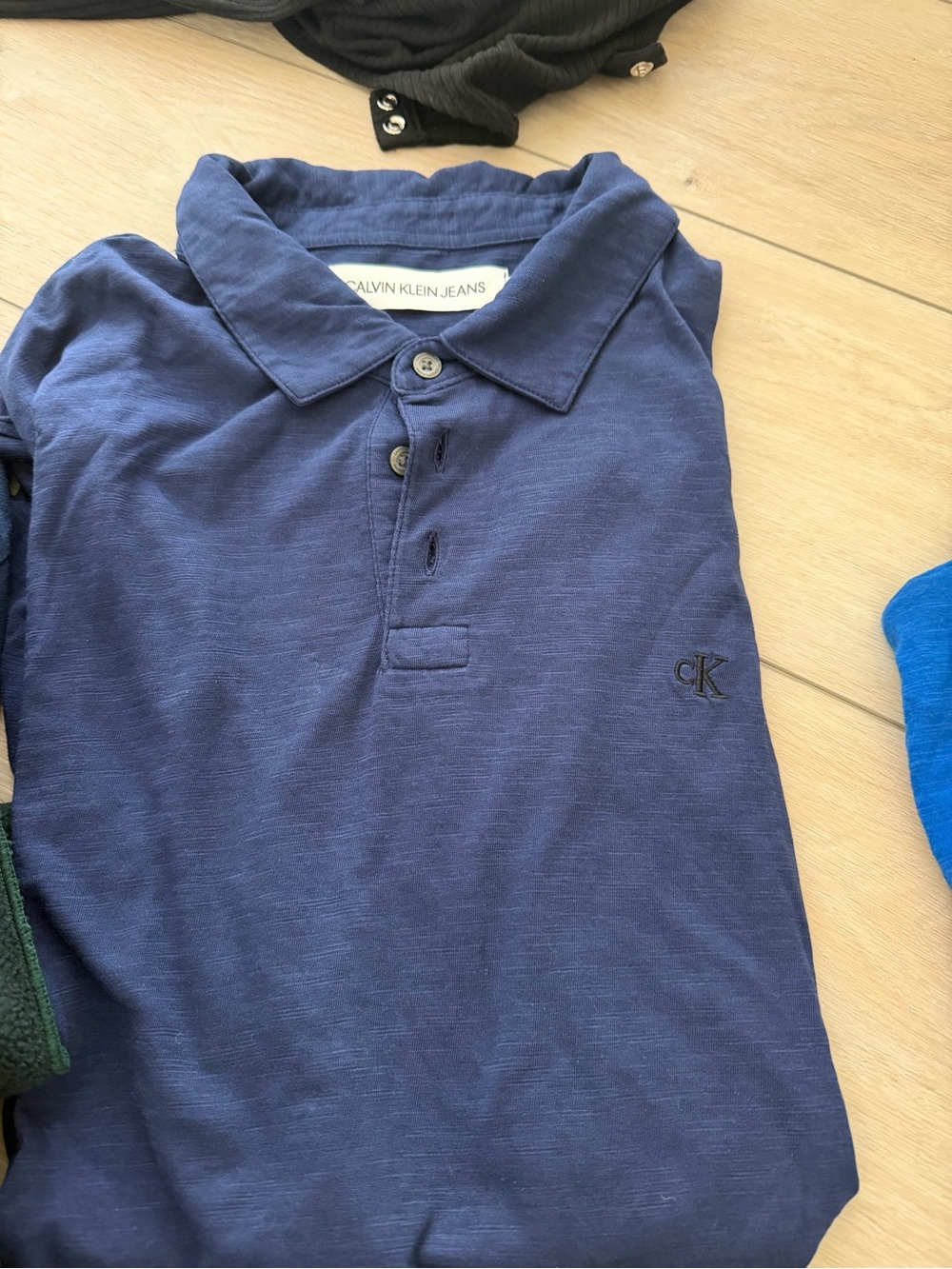 Calvin Klein mens Blue Polo Shirt with CK Embroidery. New